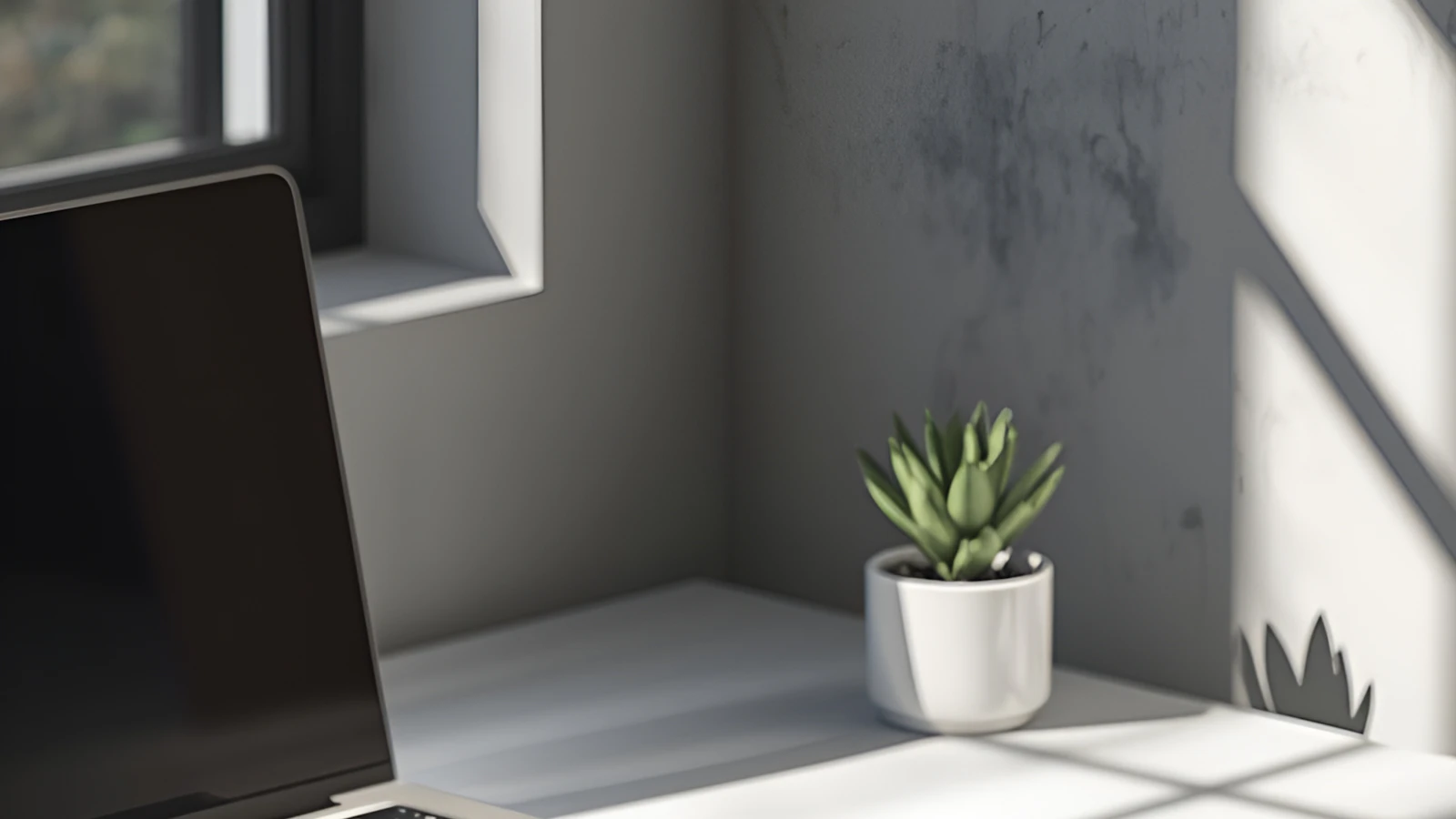 Detalhe de ambiente de trabalho tecnológico, mesa com notebook e luz natural
